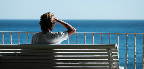 Man looking out to sea